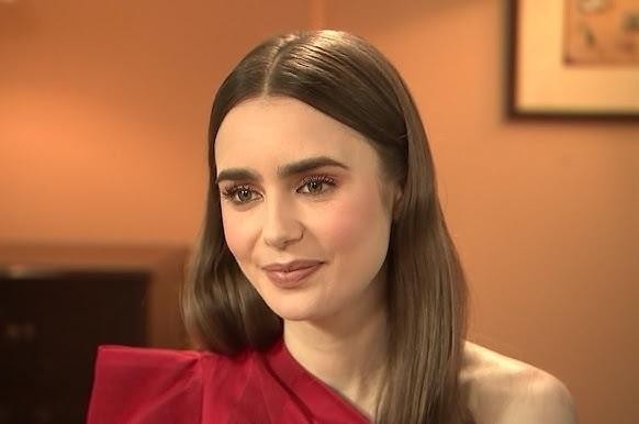 Zdjęcie ekranu smartfona z otwartym profilem Lily Collins na Instagramie, przedstawiające jej różnorodne posty.